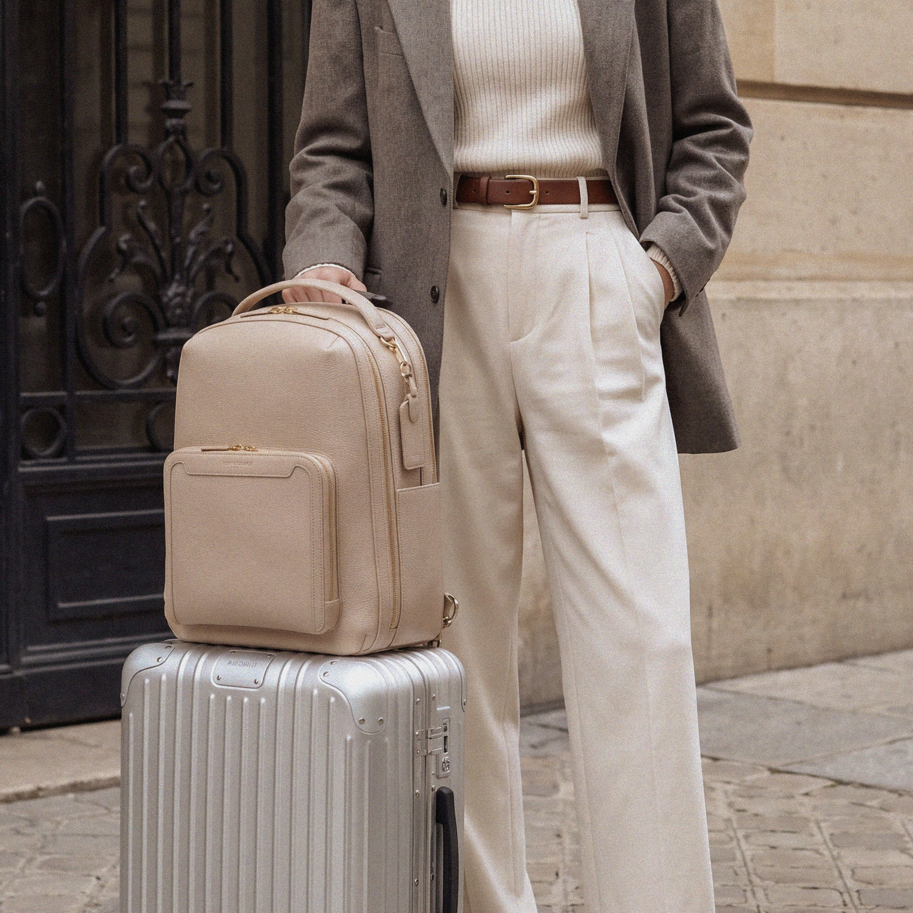 Pilot Travel Backpack on a carry-on suitcase in Paris| #color_Frappe